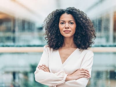 Portrait of a young African ethnicity businesswoman Resume World - Middle Level Resumes