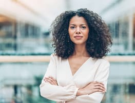 Portrait of a young African ethnicity businesswoman Resume World - Middle Level Resumes